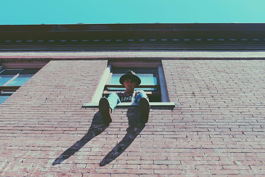 brick wall, low angle shot, man, person, window, real people HD wallpaper