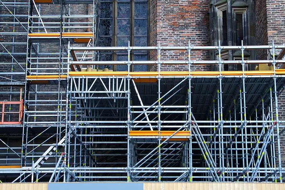 scaffolding near bricked building, panel, barrier, construction HD wallpaper