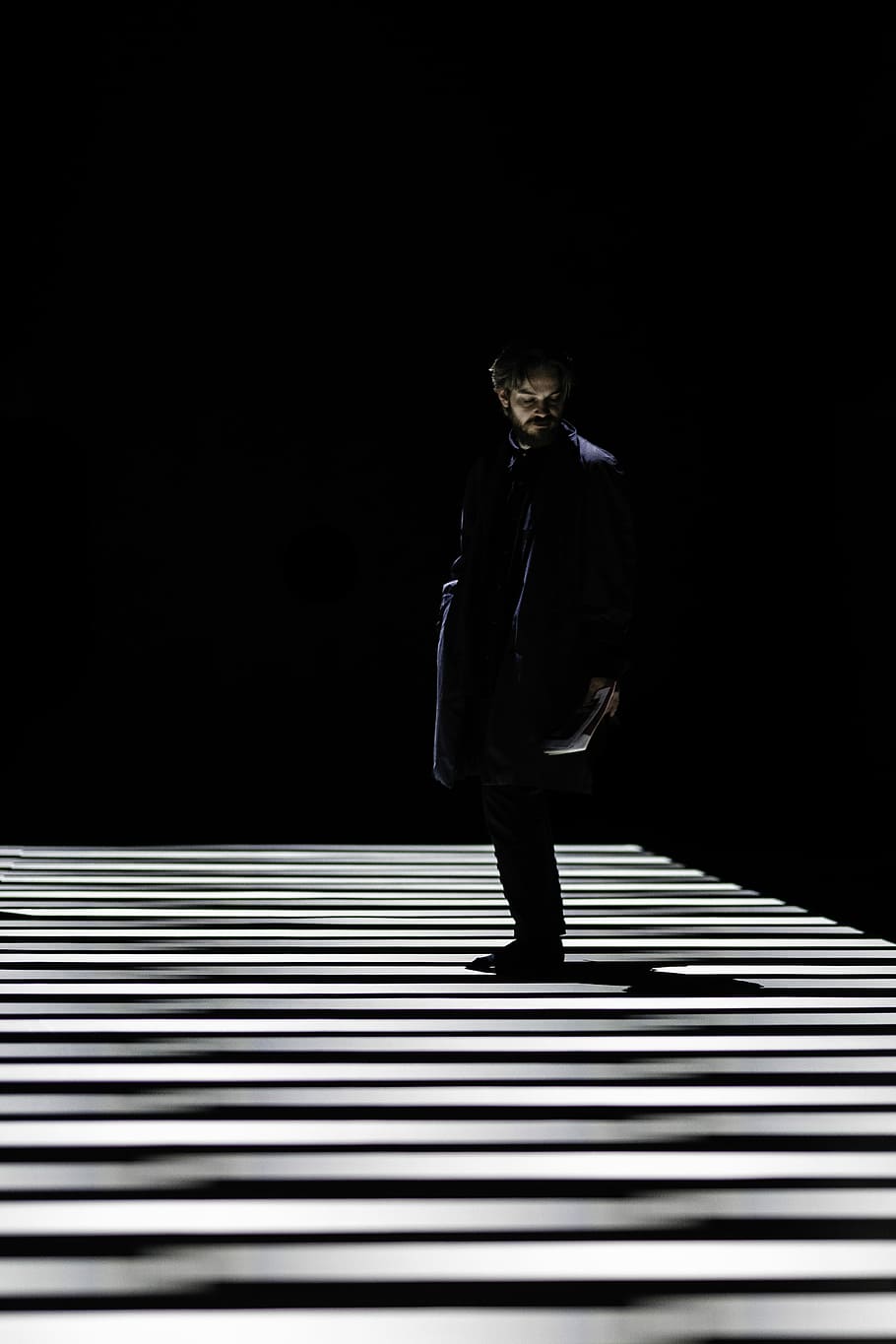 man standing on stripe shadowed floor, cool, dramatic, light HD wallpaper