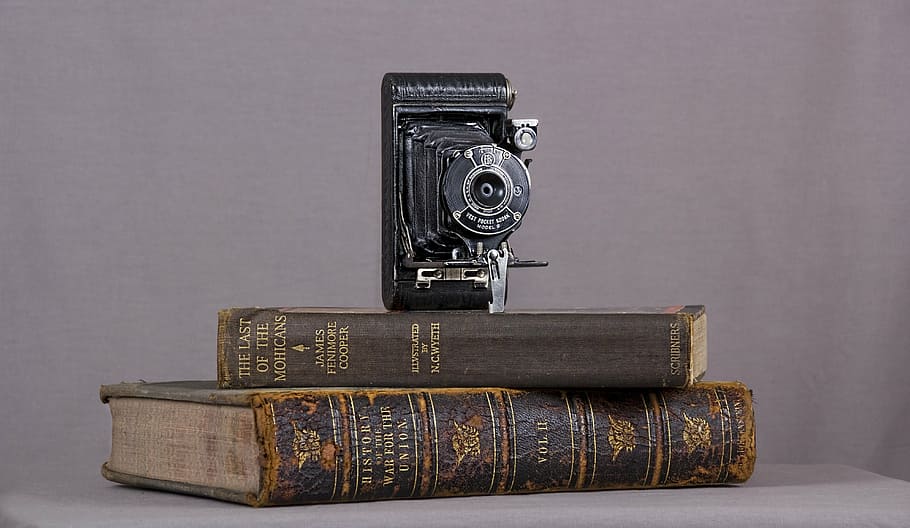 folding camera on top of brown book, books, vintage, old-fashioned HD wallpaper