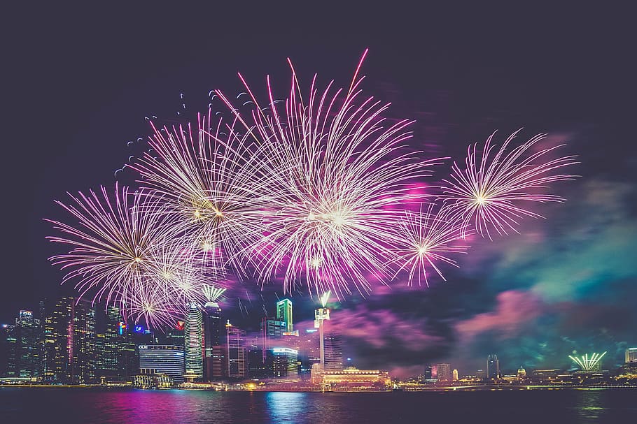 fireworks above buildings, top, lights, celebration, sky, night HD wallpaper