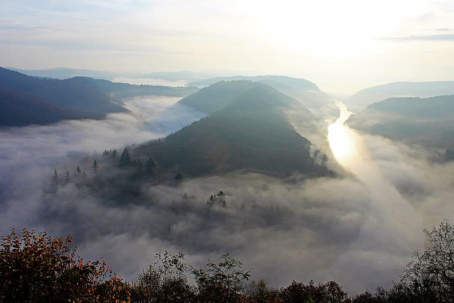 photo of valley with fog, morning mist, river landscape, saar loop