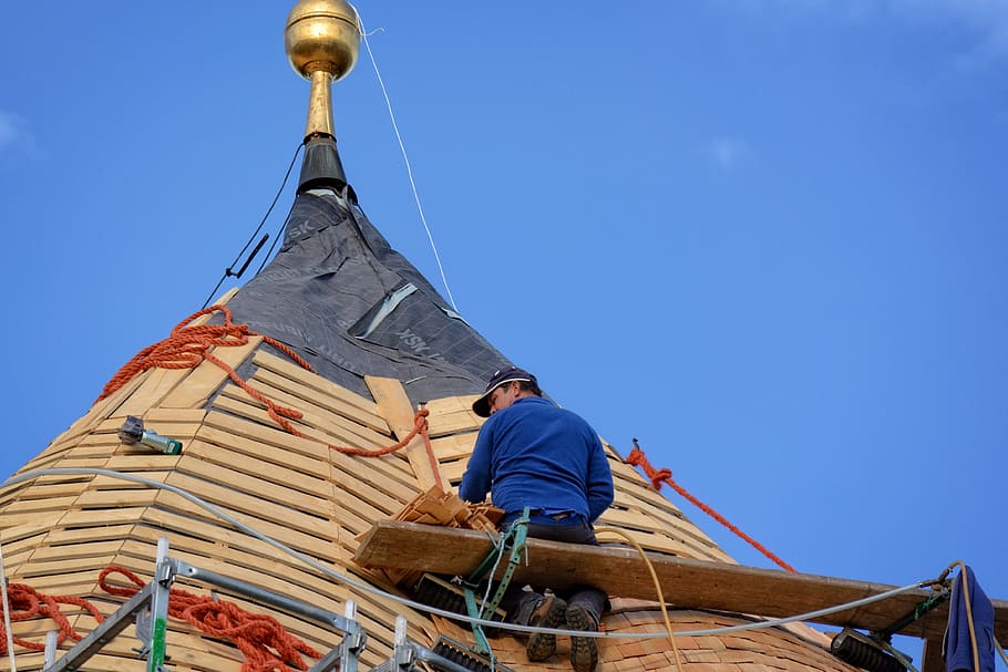 photo of man sitting on plank repairing on roof, work, craft HD wallpaper