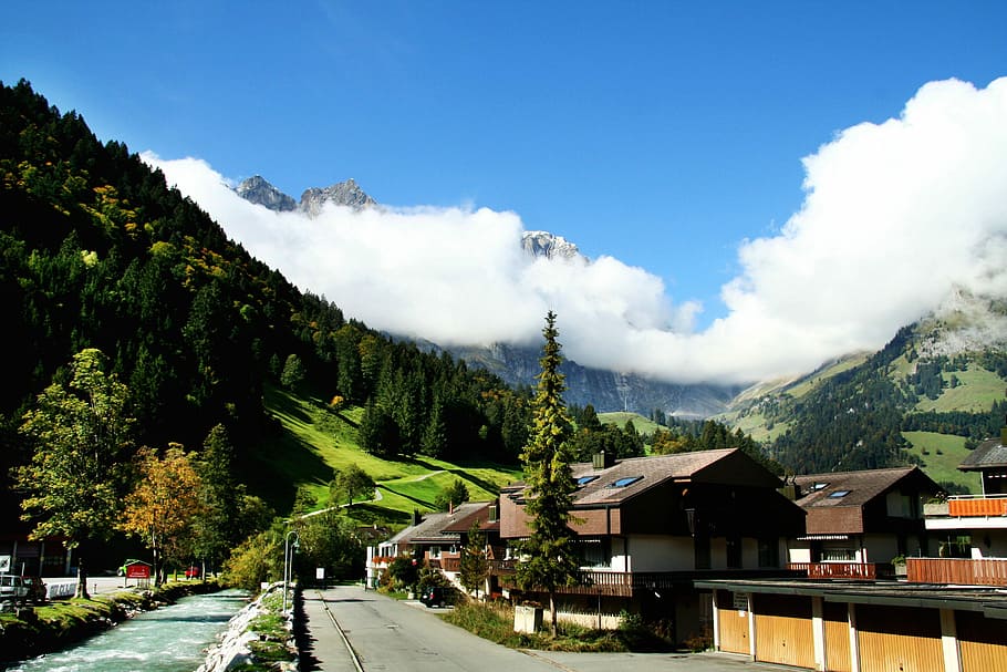Switzerland, Titlis, Snow Mountain, village, forest, ice melt