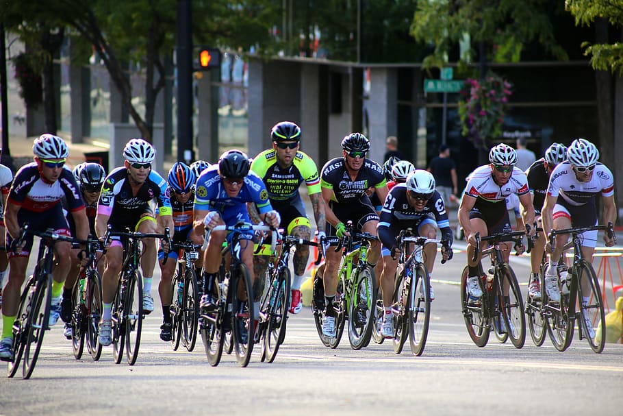 group of cyclers racing each other, Bikers, Cyclist, Biking, Activity