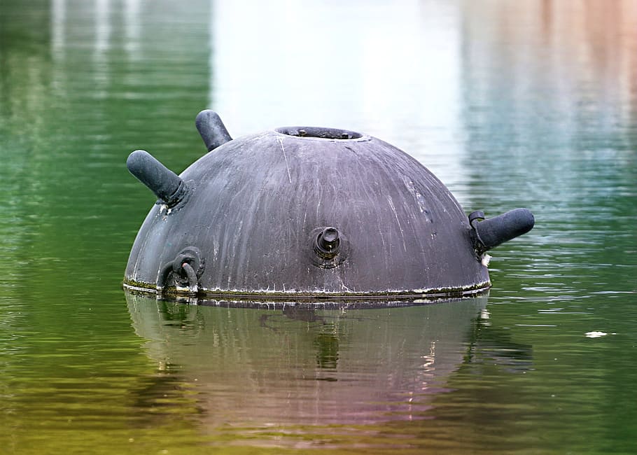 round gray container on body of water, Bomb, Mine, War, Terror HD wallpaper