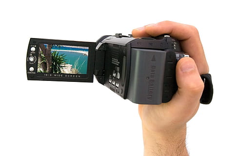 person holding black handy cam, camera, video, camcorder, digital HD wallpaper