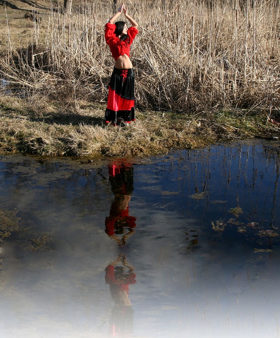 woman wearing red and black dress standing near lake, gipsy HD wallpaper