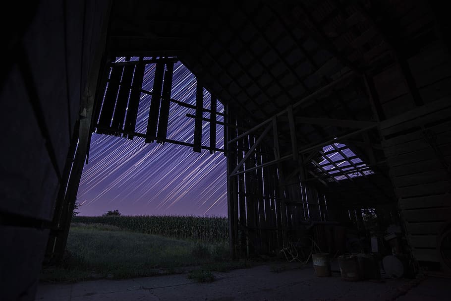 long exposure of stars above brown wooden house during nightime, barn in front field HD wallpaper