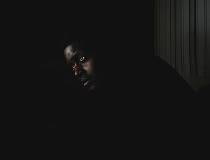 man in darkness, photo of man wearing black top, shadow, light HD wallpaper