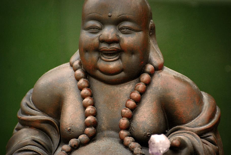 brown Budai figurine with green background, Zen, Buddha, Reflection