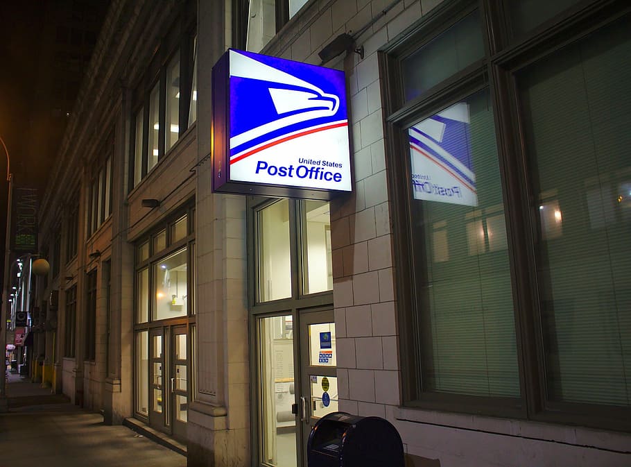Post Office lighted signage outsite, usps, building, nyc, city