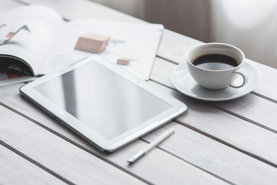 Coffee on a table with other items, morning, pot, tablet, cup HD wallpaper