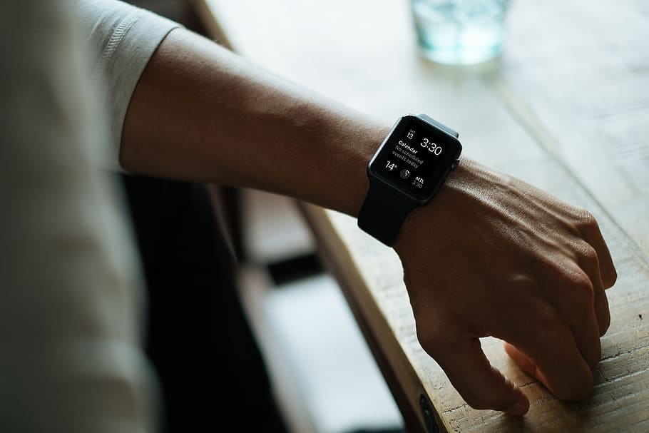 man wearing black smartwatch, black smartwatch displaying 3:30 HD wallpaper
