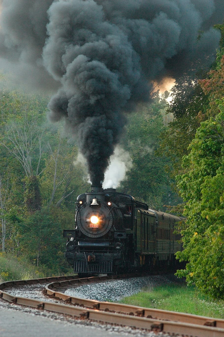 vintage charcoal train on railroad, steam locomotive, engine
