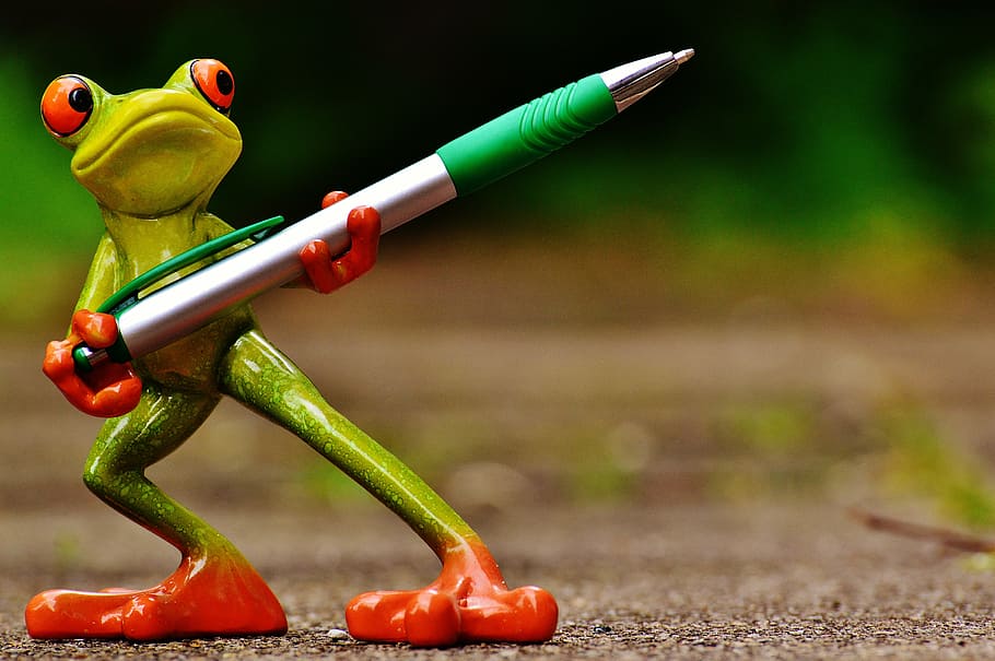 green ceramic frog figurine holding silver click pen, holder HD wallpaper