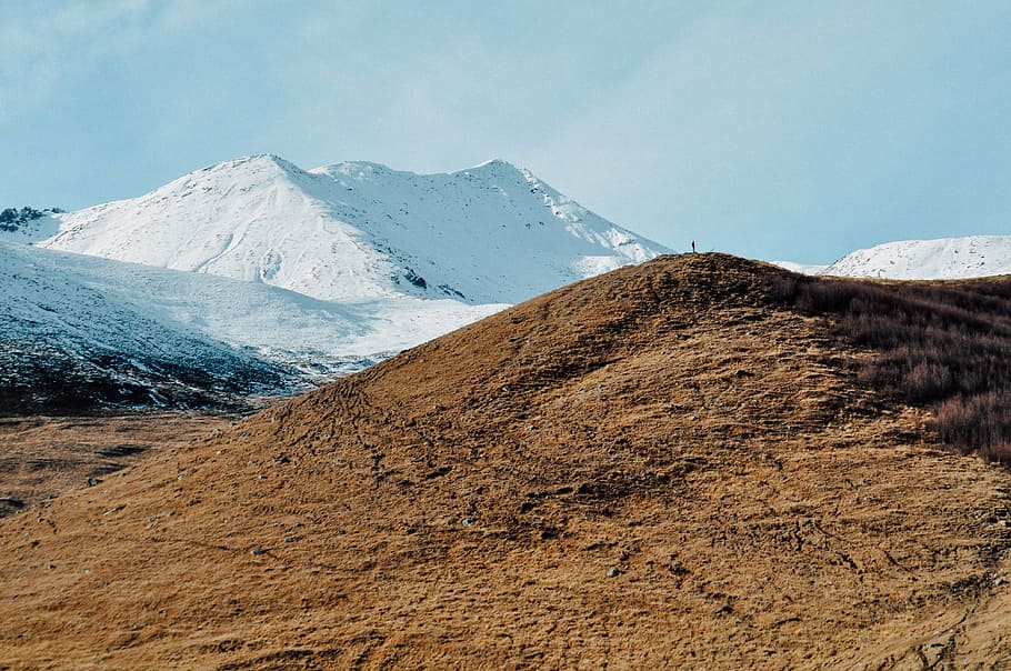 person on brown mountain during daytime, glacier, soil, covered HD wallpaper