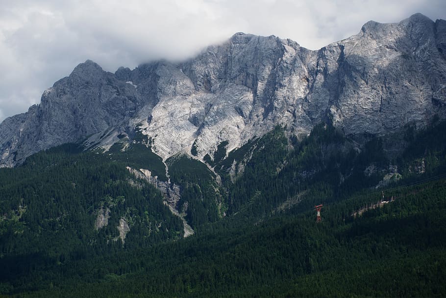 bird's eye view photography of mountain, green trees and mountain under cloudy sky HD wallpaper