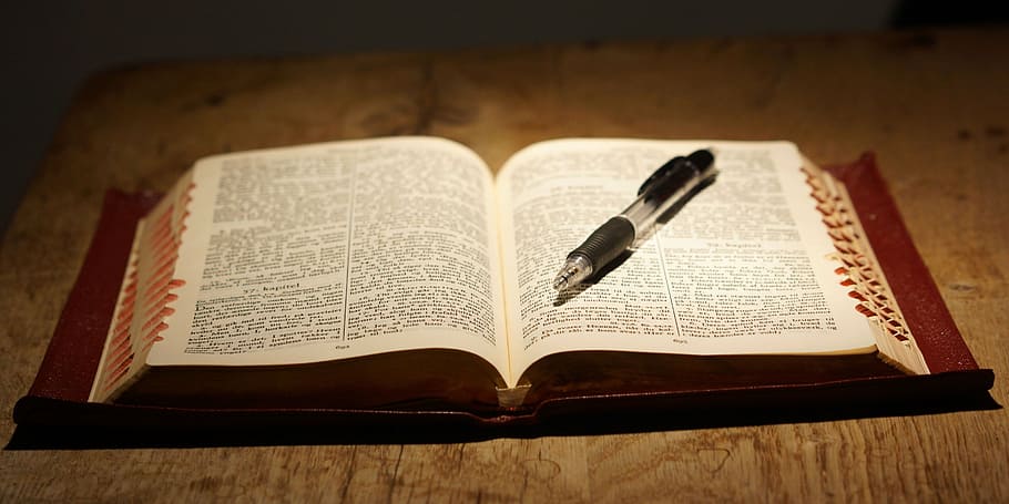 opened bible with click pen, book, read, table, publication, paper, HD wallpaper