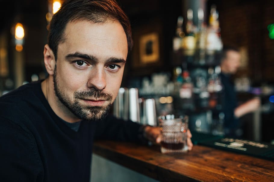 Handsome young man in a pub, adult, drink, male, restaurant, bar
