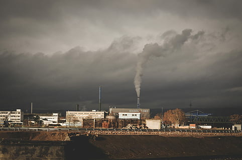 Factory releasing smoke under cloudy sky, pollution, industry HD wallpaper