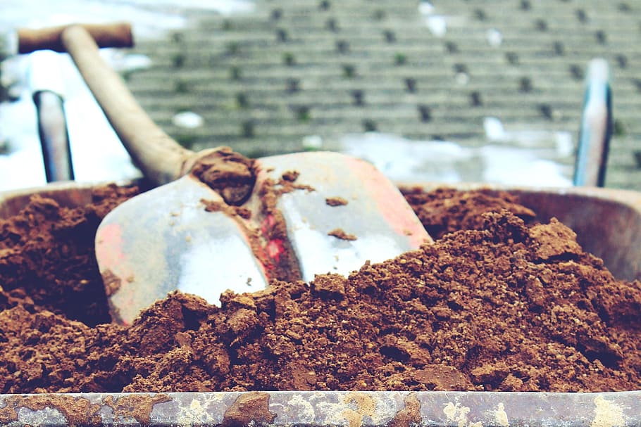 close up photo of soil in wheelbarrow with shovel, brown soil HD wallpaper