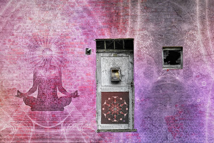 wall painted with person meditating, mandala, chakra, brick, door