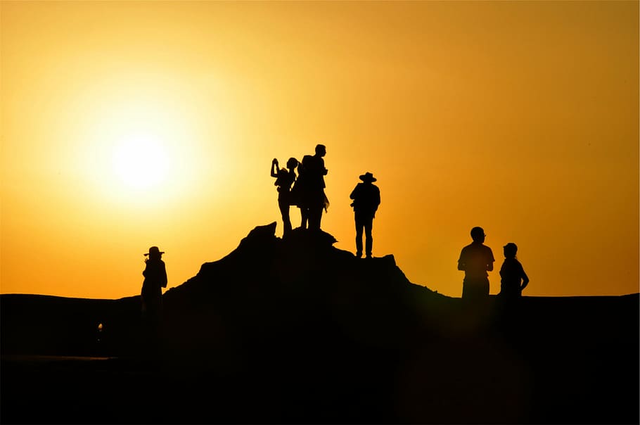 Free Download Hd Wallpaper Silhouette Of People During Golden Hour Standing Cliff Sunset