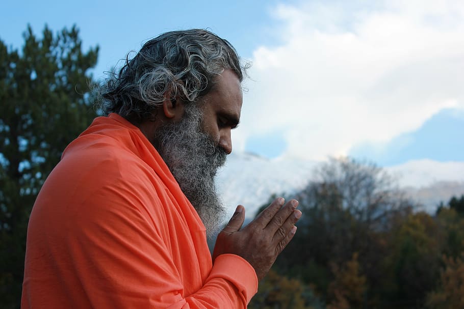 man in orange long-sleeved shirt, namaste, indian, master, mountain