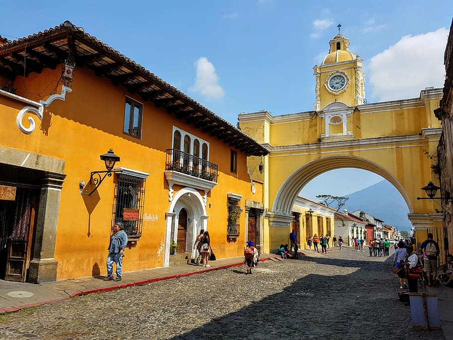 yellow and orange concrete building near people walking, architecture, HD wallpaper