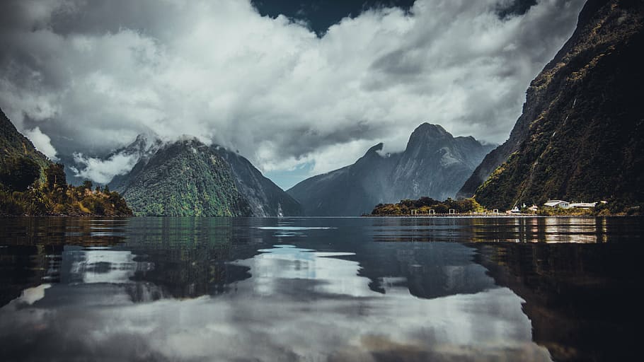 mountain range surrounded with water, highland, cloud, sky HD wallpaper