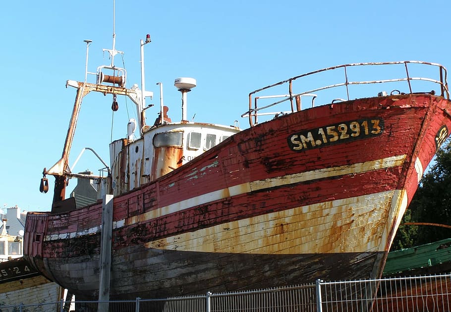 rusty old ship docked near a dock, boats, old ships, wrecks, brittany
