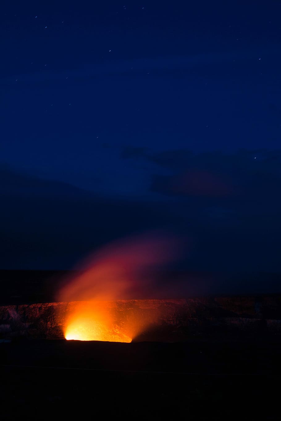 focus photography of red and orange light at night, lighted fire on hole during night time HD wallpaper