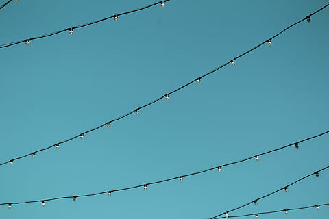 worm's eye view photography of black string lights, string lights under blue sky during daytime photography HD wallpaper