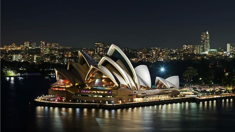 Night Time Opera House with city skyline in Sydney, New South Wales, Australia