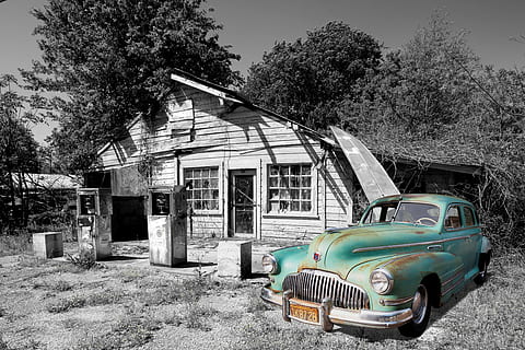 selective color photography of vintage green car parked beside white wooden house HD wallpaper