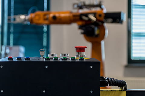 tilt shift lens photo of black control panel, robot, arm, technology HD wallpaper