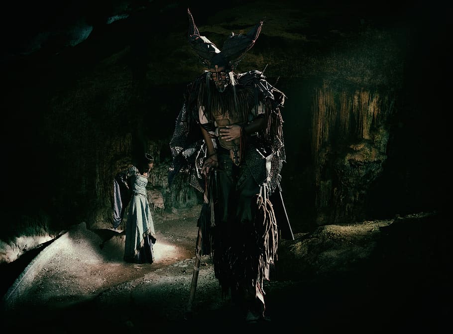 horned male character walking near woman in gray dress wallpaper HD wallpaper
