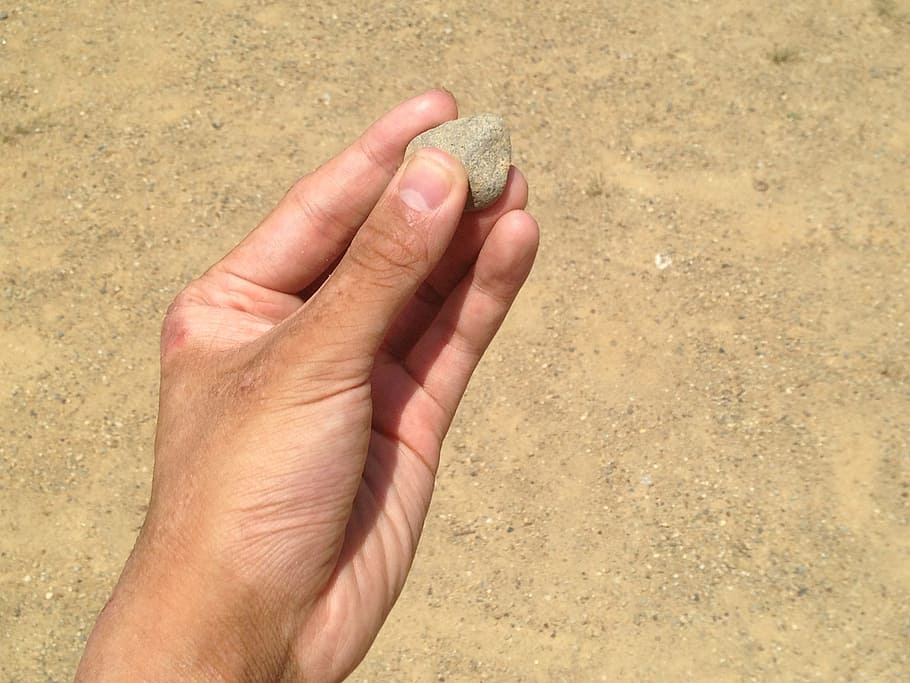 person holding brown rock, Hand, Nail, Stone, Sand, Sandpit HD wallpaper