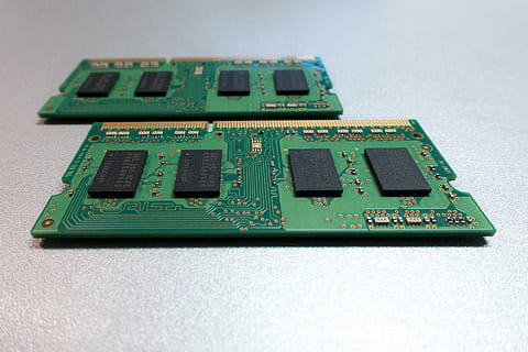 two green RAM sticks on white surface, printed circuit board HD wallpaper