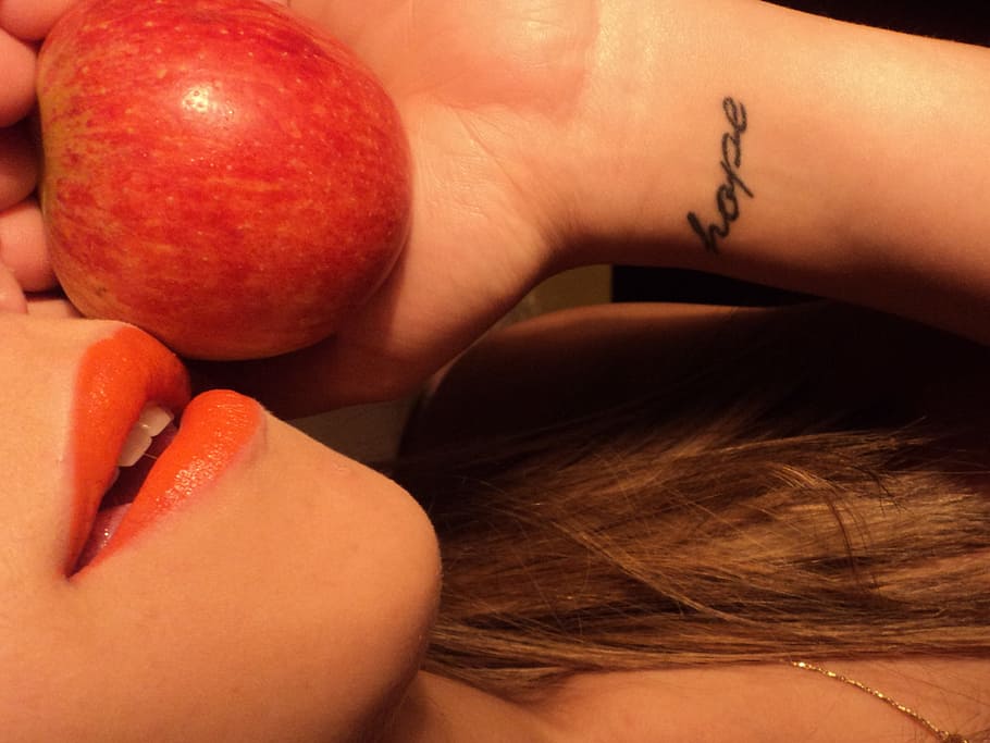 person holding red apple fruit, lipstick, human body part, human hand HD wallpaper