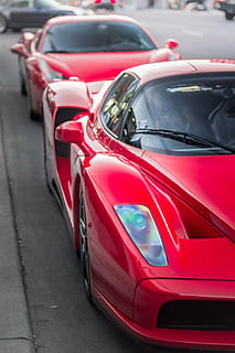 two red sports cars on asphalt road way, ferrari, enzo, transportation HD wallpaper
