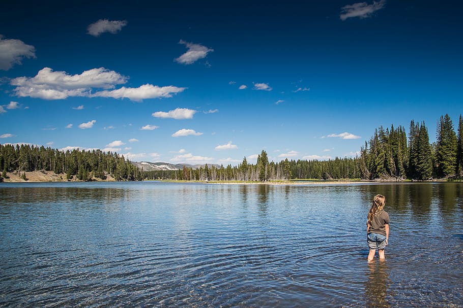 Little Kid in Lake in the USA, clouds, forest, nature, water HD wallpaper
