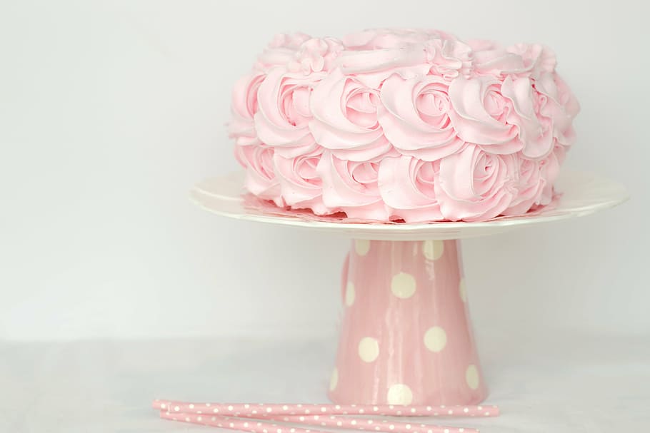 pink icing coated cake on white and pink cake stand, sweet, birthday