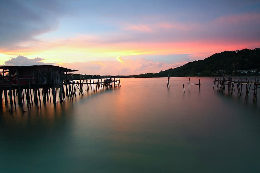 cottage over body of water during golden hour, beach, clouds HD wallpaper