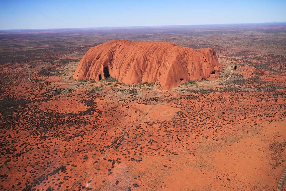 brown sand mountain during daytime, uluru, ayers rock, australia