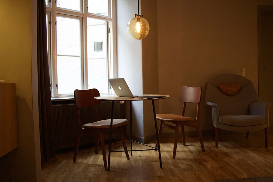 silver MacBook on top of brown table near window, chair, laptop HD wallpaper
