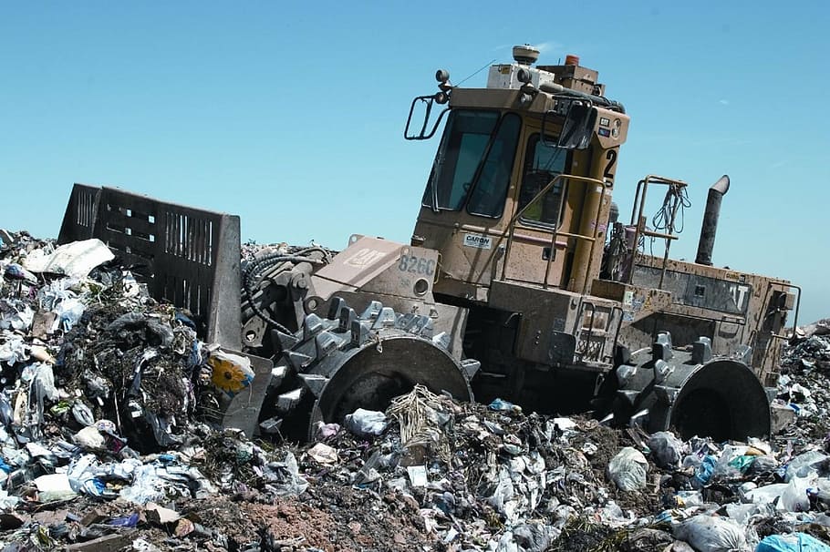 brown heavy equipment, compactor, landfill, grader, trash, machine