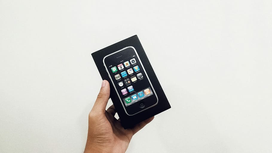 person holding iPhone 3GS box, person holding black iPhone box, HD wallpaper