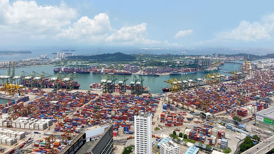 aerial view of buildings near body of rwater, port, ships, cranes HD wallpaper